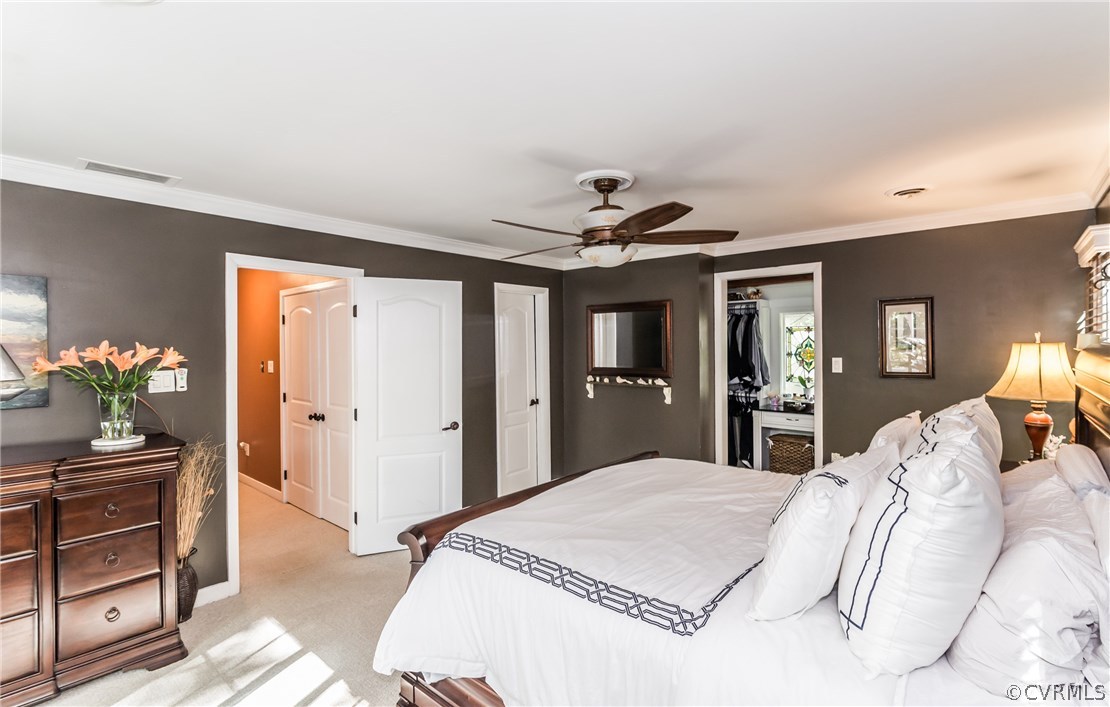 3216 Fortunes Ridge Road Midlothian, VA 23112 - Photo 25 of 41 a bedroom with a bed and a chandelier