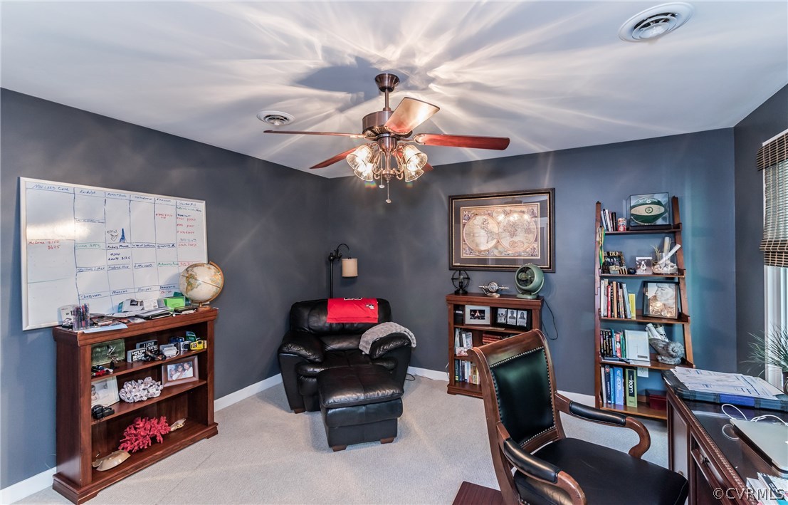 3216 Fortunes Ridge Road Midlothian, VA 23112 - Photo 27 of 41 a view of a workspace with bookshelf and a window