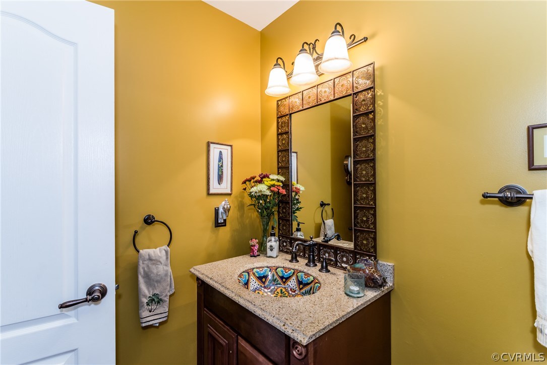 3216 Fortunes Ridge Road Midlothian, VA 23112 - Photo 33 of 41 a bathroom with a sink and a mirror