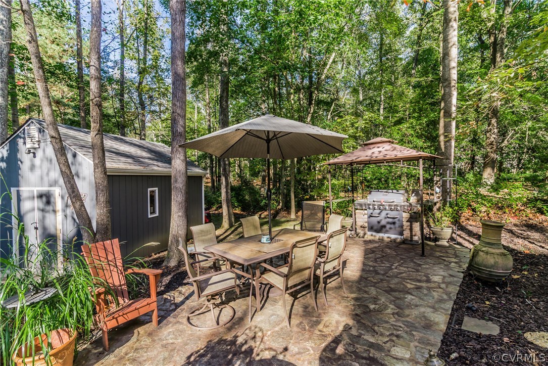 3216 Fortunes Ridge Road Midlothian, VA 23112 - Photo 34 of 41 a view of a dinning table and chairs in the patio