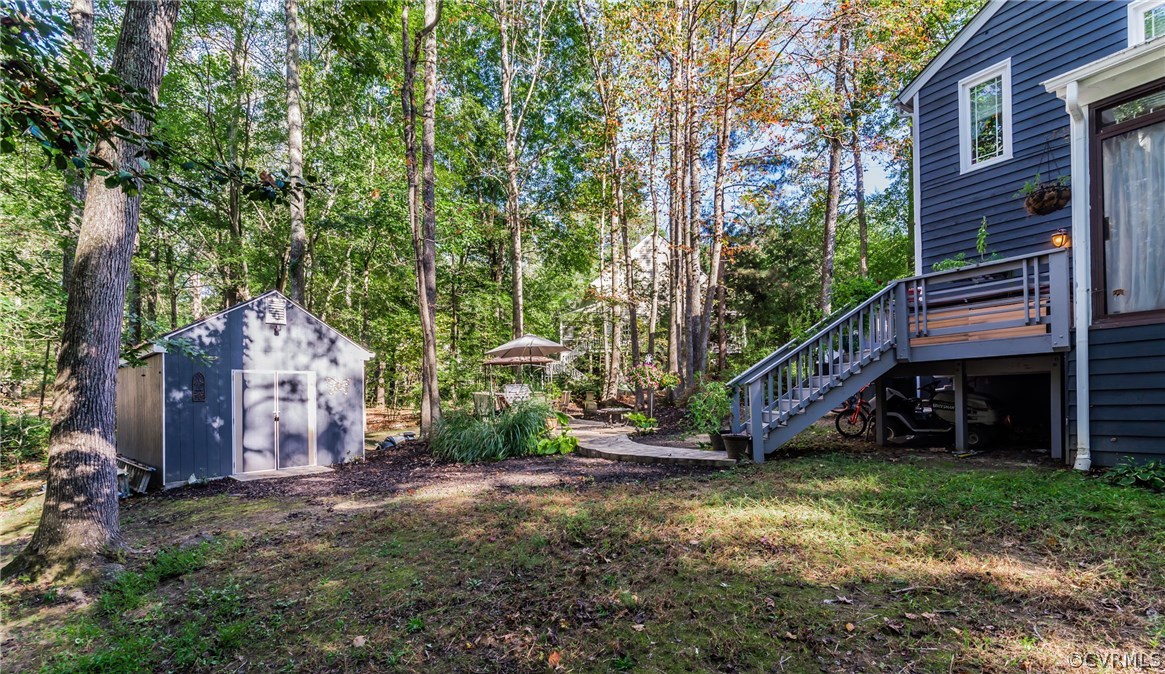 3216 Fortunes Ridge Road Midlothian, VA 23112 - Photo 39 of 41 a backyard of a house with lots of green space