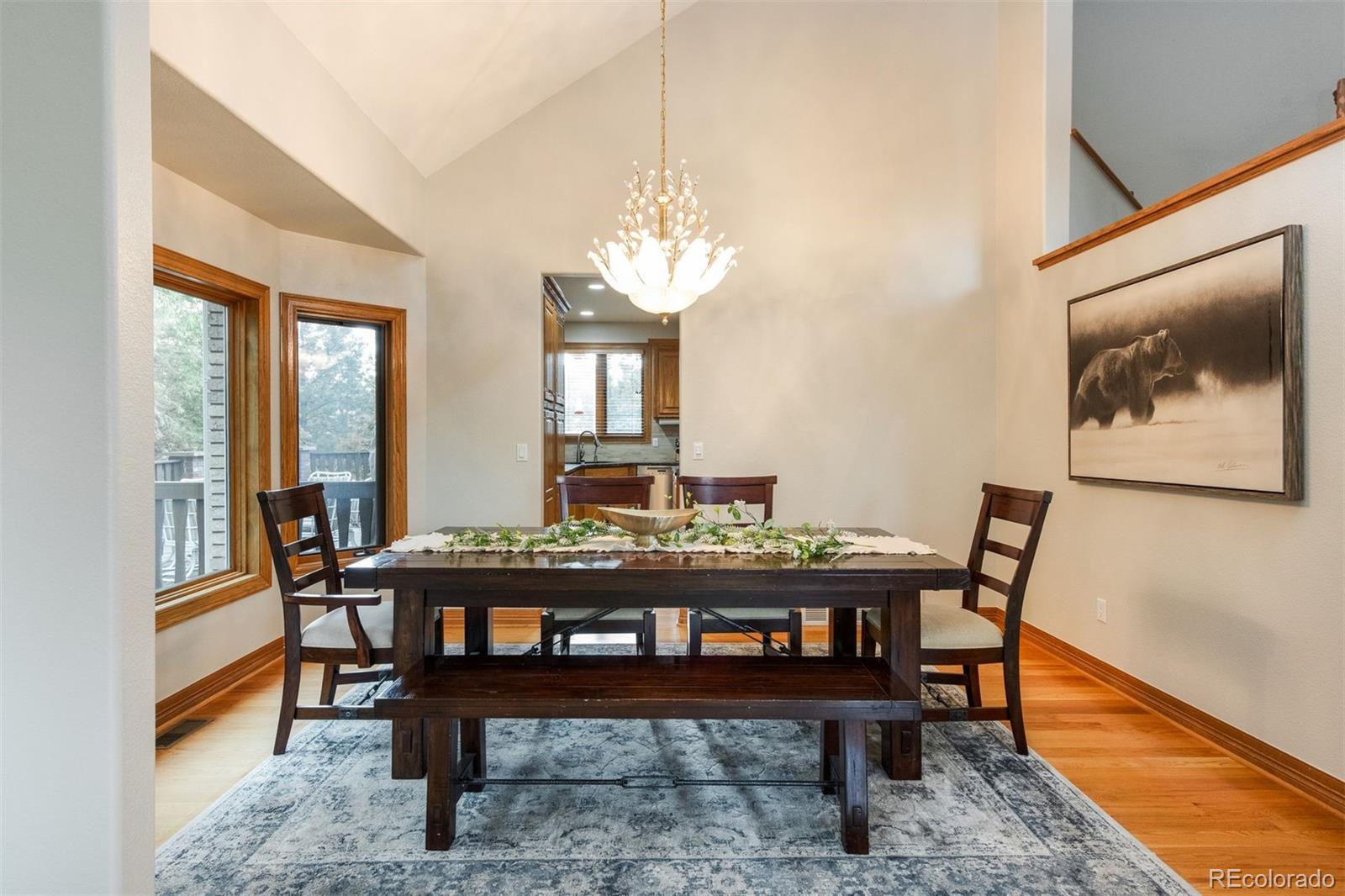 3935 Pierson Street Wheat Ridge, CO 80033 - Photo 12 of 50 a view of a dining room with furniture window and outside view
