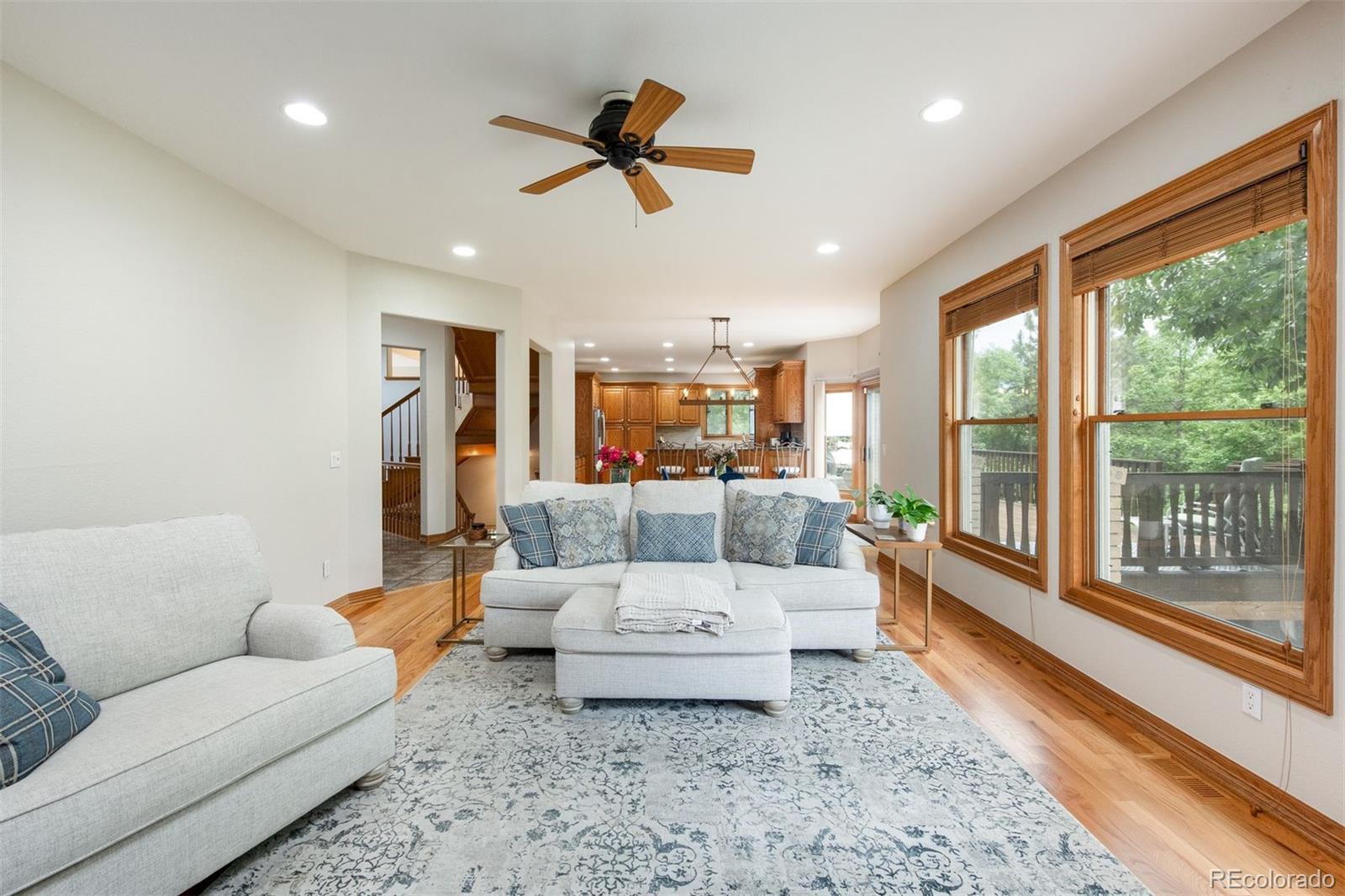 3935 Pierson Street Wheat Ridge, CO 80033 - Photo 13 of 50 a living room with furniture and a large window