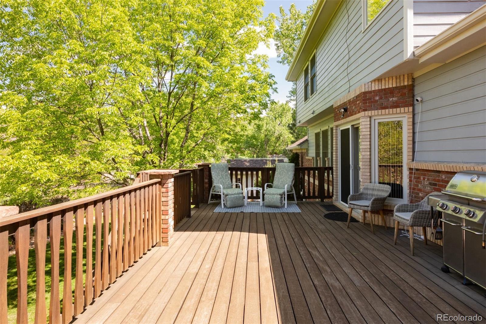 3935 Pierson Street Wheat Ridge, CO 80033 - Photo 48 of 50 a view of backyard with deck and outdoor seating