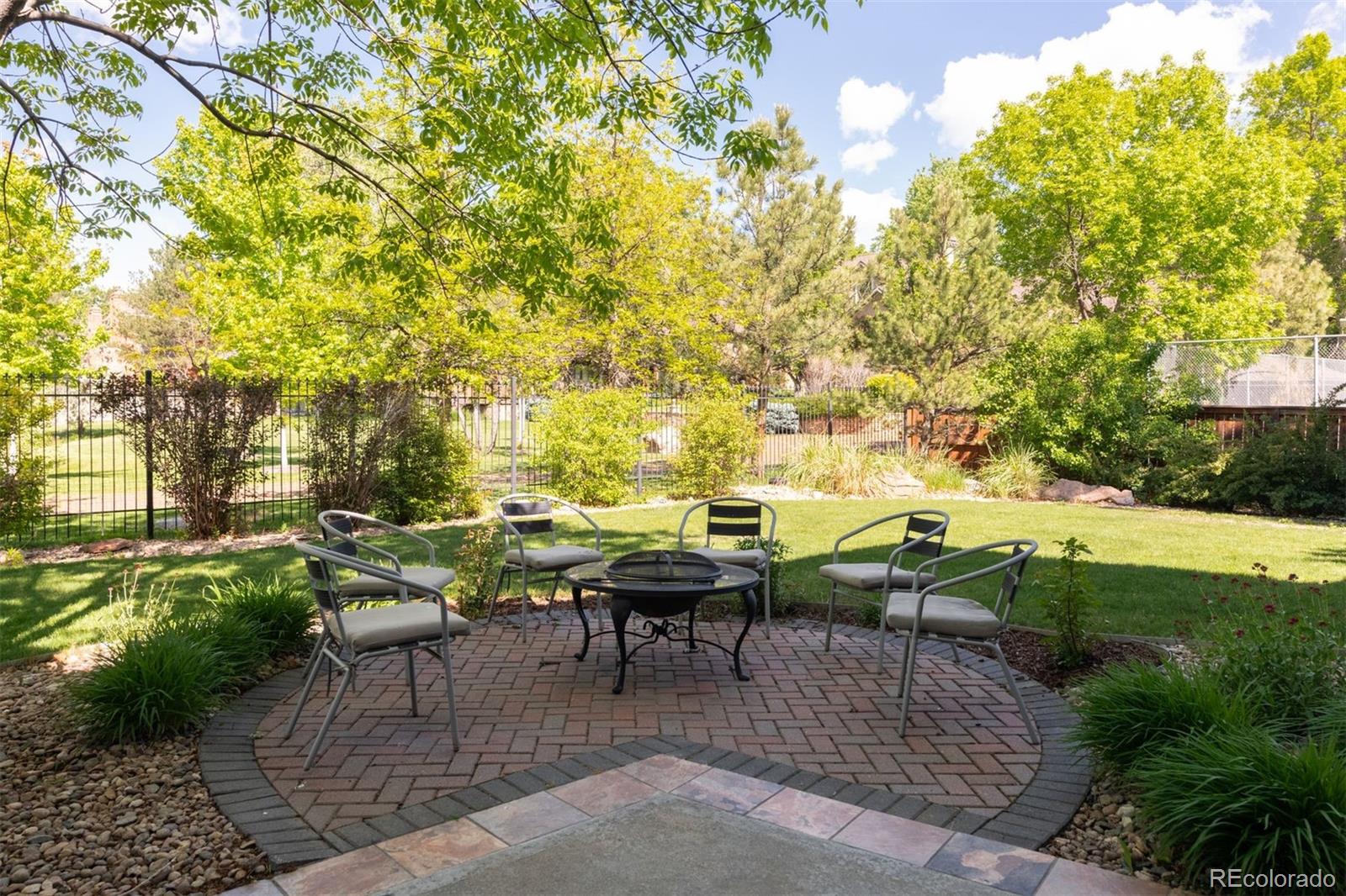 3935 Pierson Street Wheat Ridge, CO 80033 - Photo 7 of 50 a view of a tables and chairs in a patio