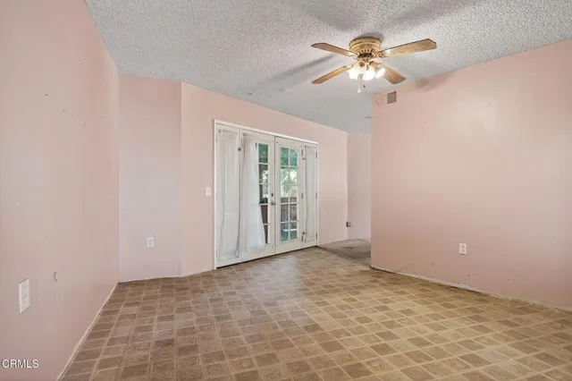 a kitchen with stainless steel appliances a refrigerator sink and stove