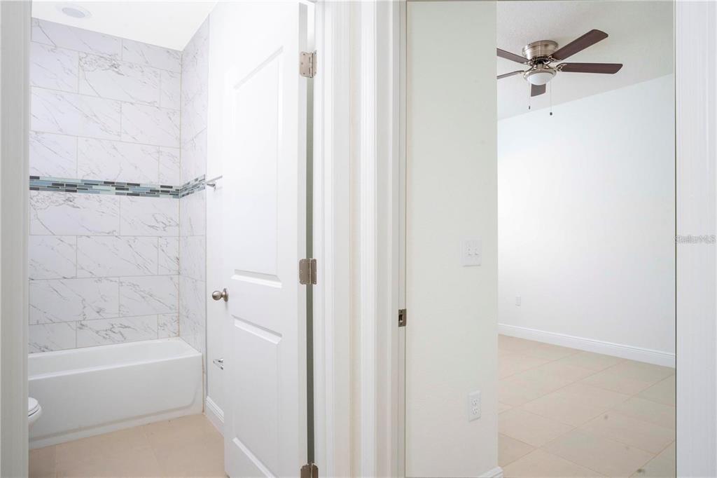 4147 Southwest 167th Street Ocala, FL 34473 - Photo 27 of 45 a bathroom with a bathtub