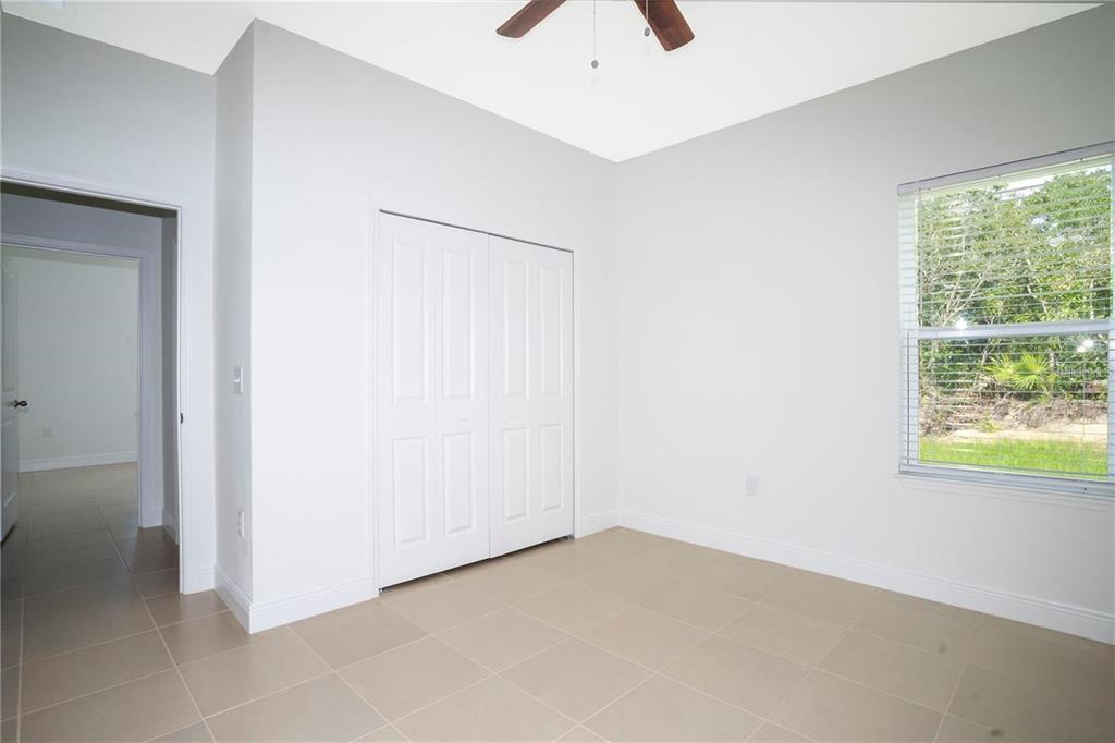 4147 Southwest 167th Street Ocala, FL 34473 - Photo 28 of 45 a view of an empty room with a window