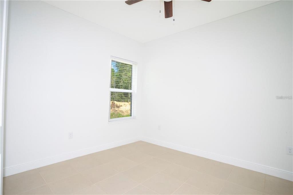4147 Southwest 167th Street Ocala, FL 34473 - Photo 29 of 45 a view of an empty room with a window