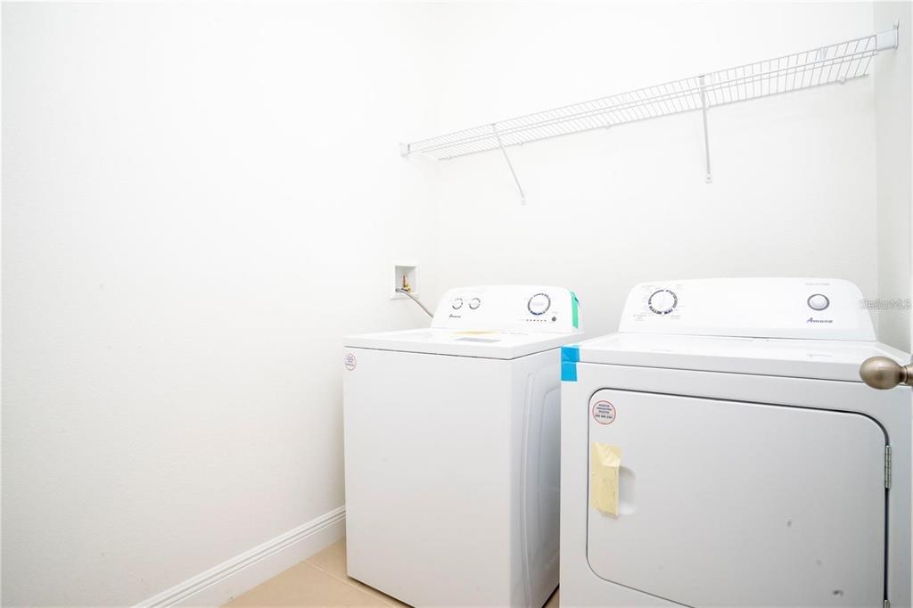 4147 Southwest 167th Street Ocala, FL 34473 - Photo 39 of 45 a utility room with dryer and washer