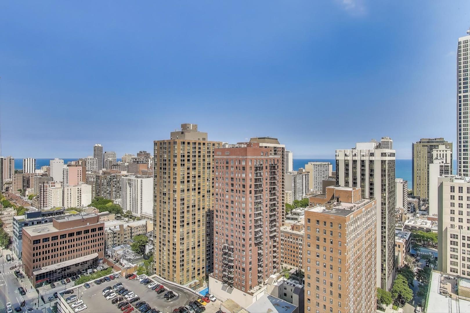 111 West Maple Street, Unit 2601 Chicago, IL 60610 - Photo 13 of 23 a view of city with tall buildings