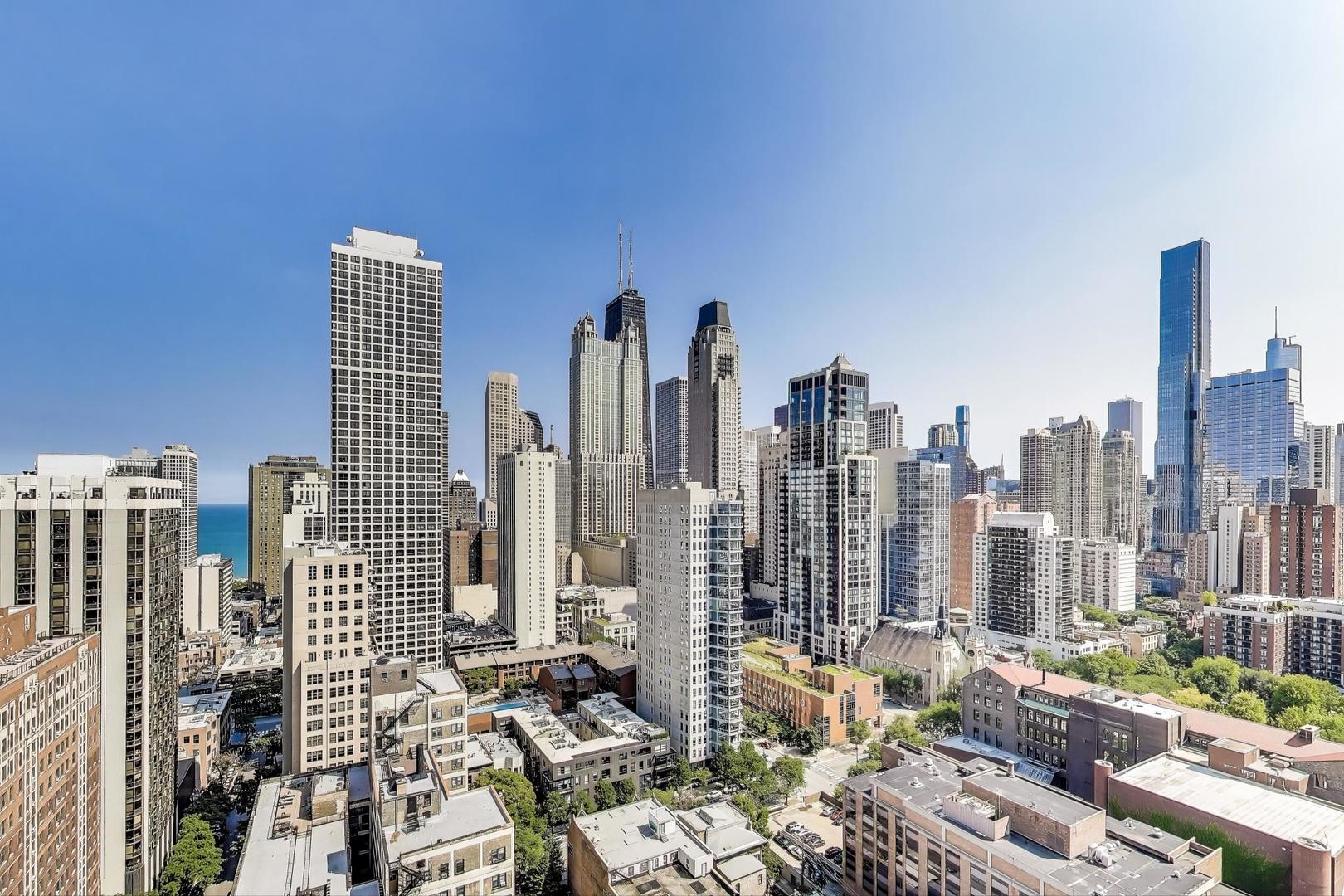 111 West Maple Street, Unit 2601 Chicago, IL 60610 - Photo 20 of 23 a view of city with tall buildings