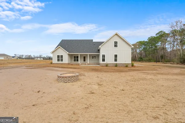 a view of house with outdoor space and street view