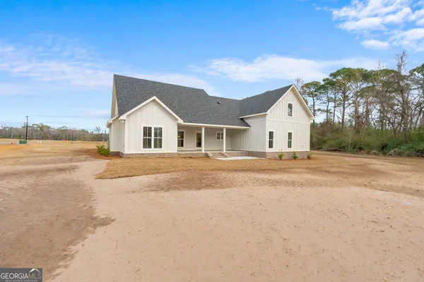 a sign that is sitting in the grass