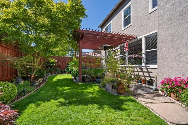 a view of a house with a garden