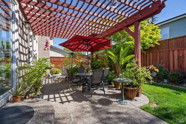 a patio with an outdoor seating