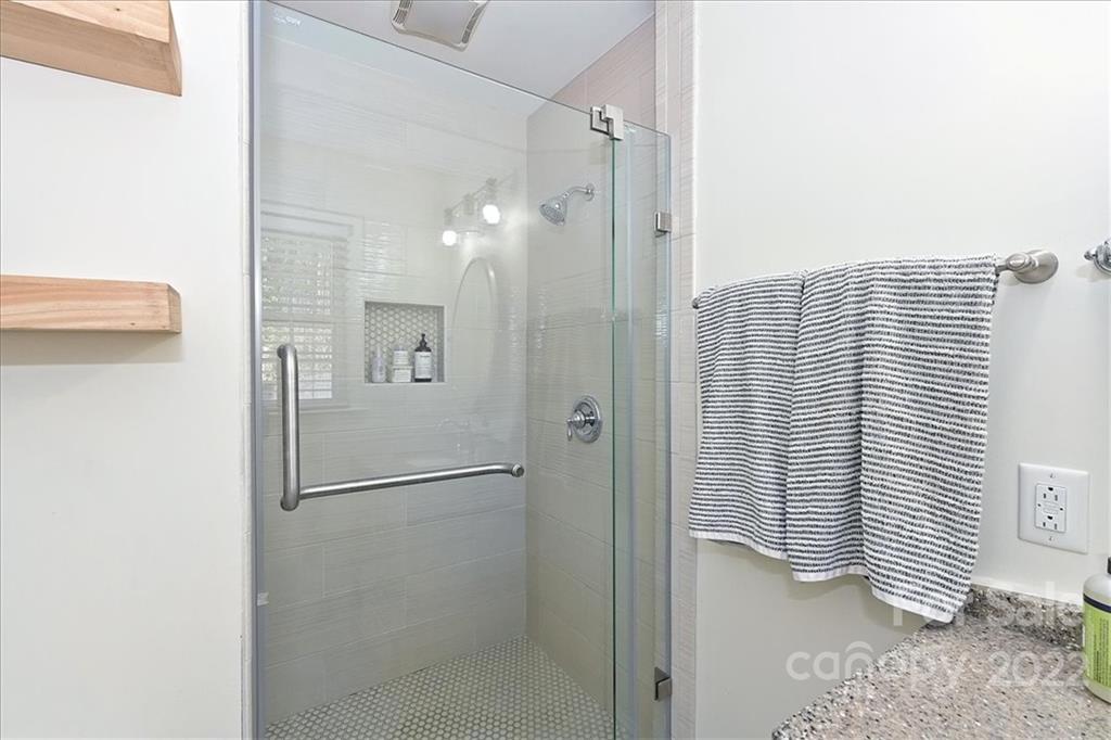 5638 Londonderry Road Charlotte, NC 28210 - Photo 26 of 44 a bathroom with a shower and a sink