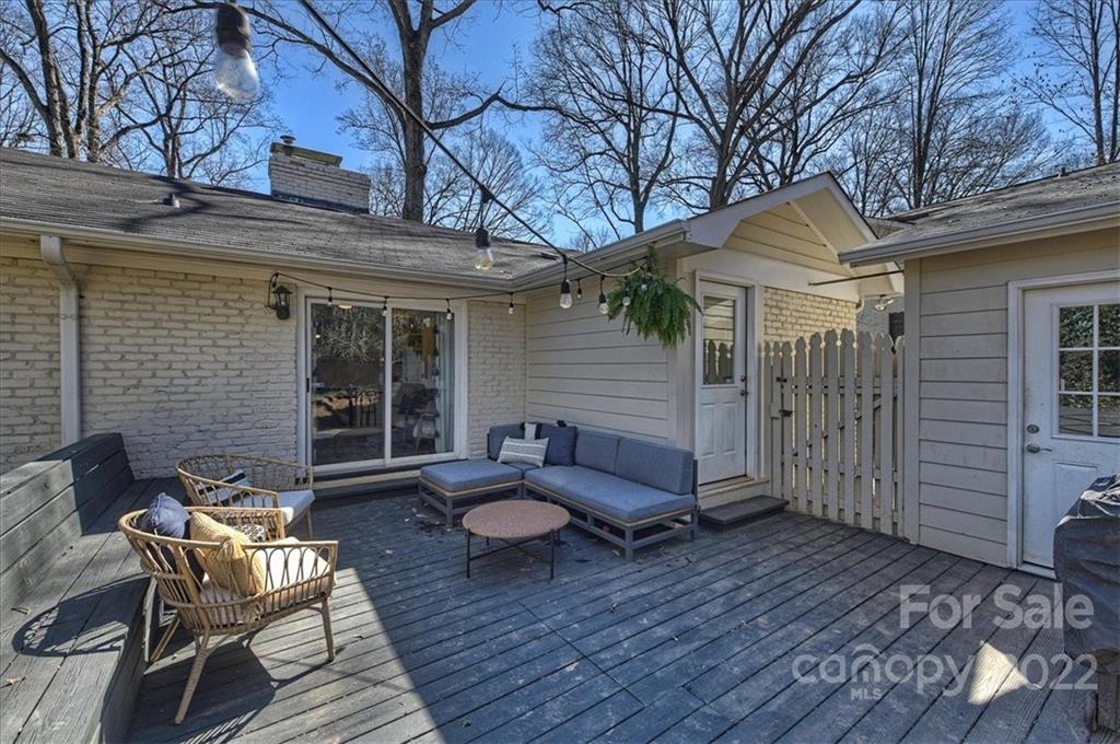 5638 Londonderry Road Charlotte, NC 28210 - Photo 35 of 44 a view of a chairs and table in backyard of the house