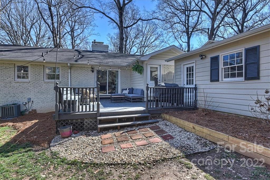 5638 Londonderry Road Charlotte, NC 28210 - Photo 36 of 44 a view of a house with furniture and wooden fence