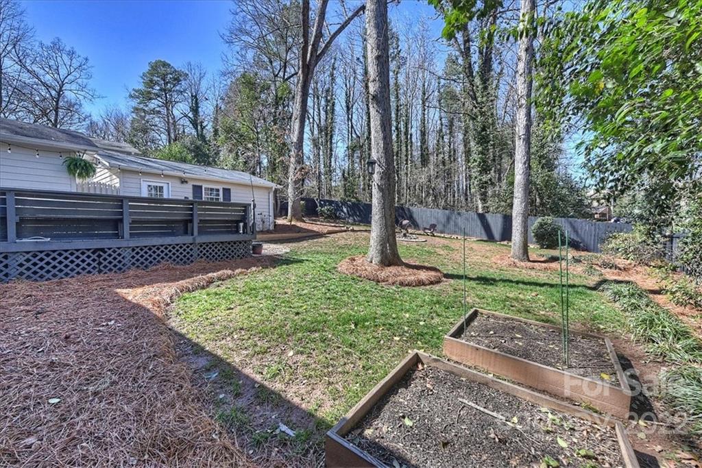 5638 Londonderry Road Charlotte, NC 28210 - Photo 38 of 44 a view of a backyard with trees