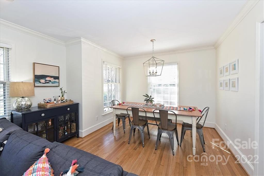 5638 Londonderry Road Charlotte, NC 28210 - Photo 8 of 44 a view of a dining room with furniture and wooden floor