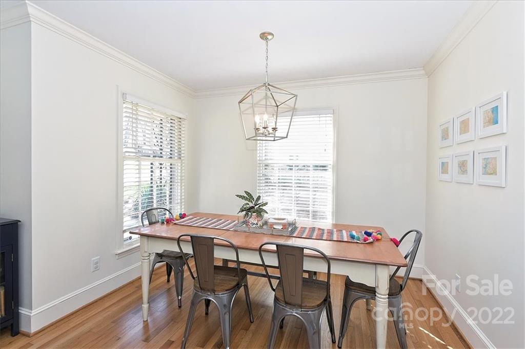 5638 Londonderry Road Charlotte, NC 28210 - Photo 9 of 44 a view of a dining room with furniture window and wooden floor
