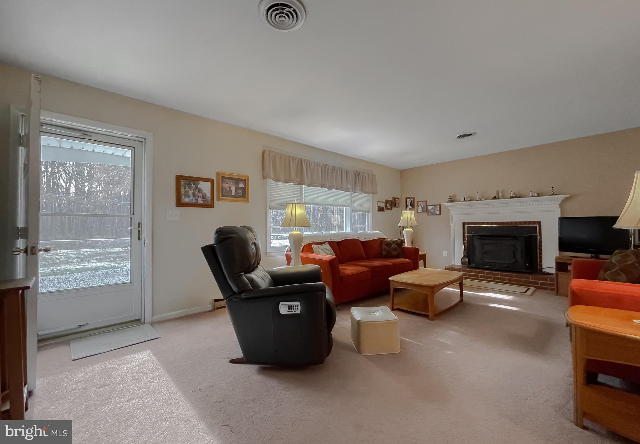 49078 Wynne Road Ridge, MD 20680 - Photo 4 of 57 Cozy living space with natural light.