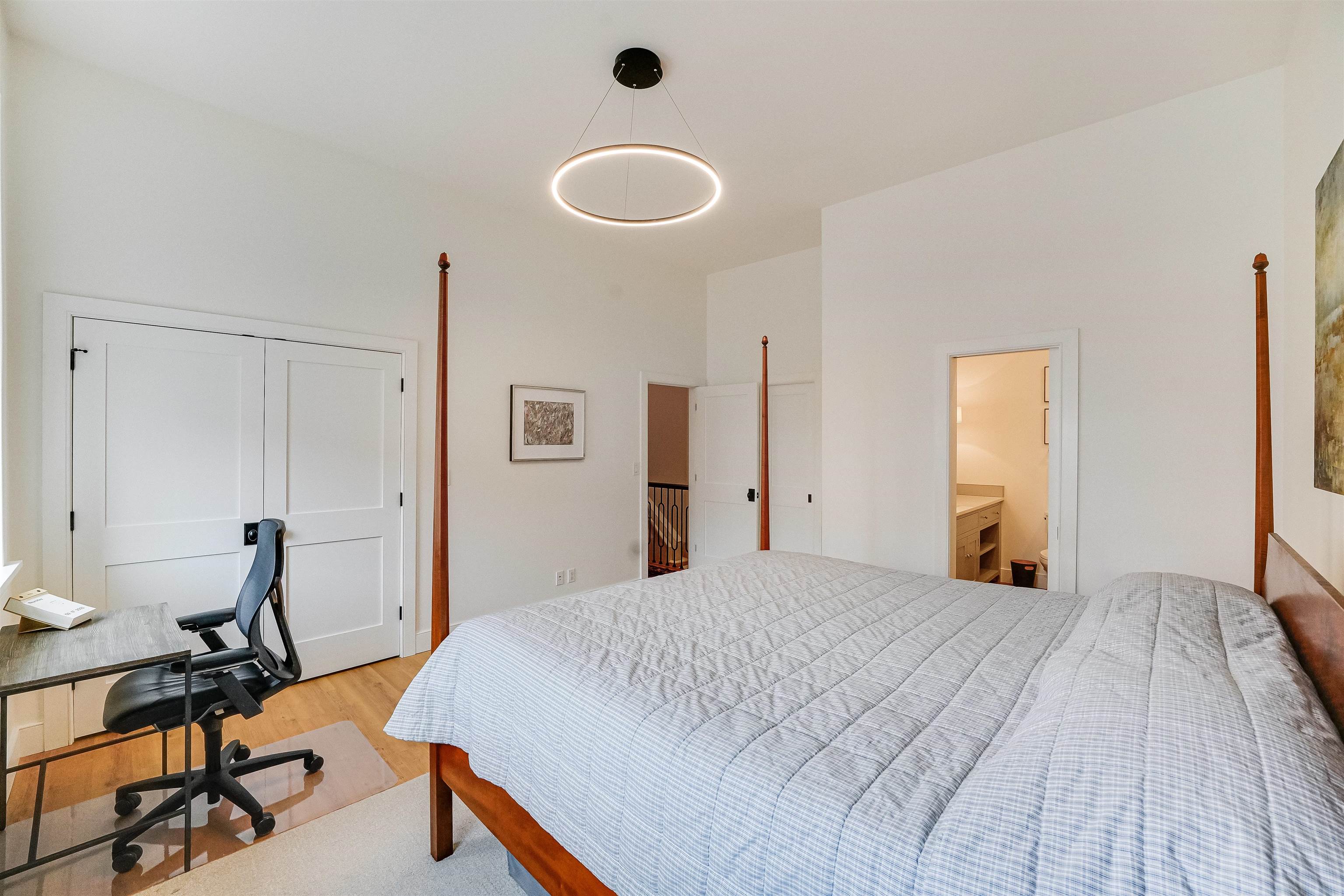 222 Clinton Street, Unit 19 Hoboken, NJ 07030 - Photo 18 of 31 a bedroom with a bed and a table