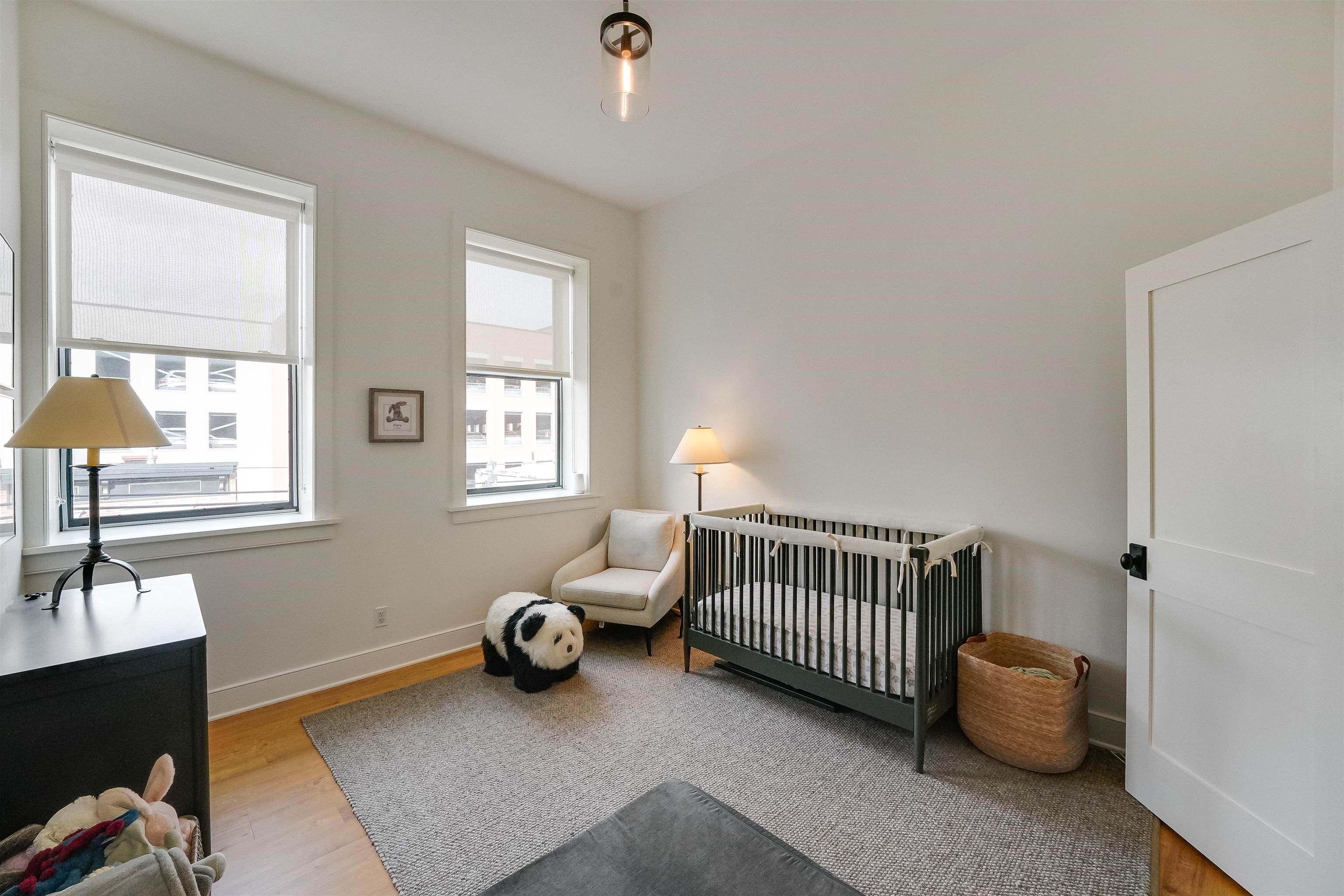 222 Clinton Street, Unit 19 Hoboken, NJ 07030 - Photo 20 of 31 a bedroom with bed and a window