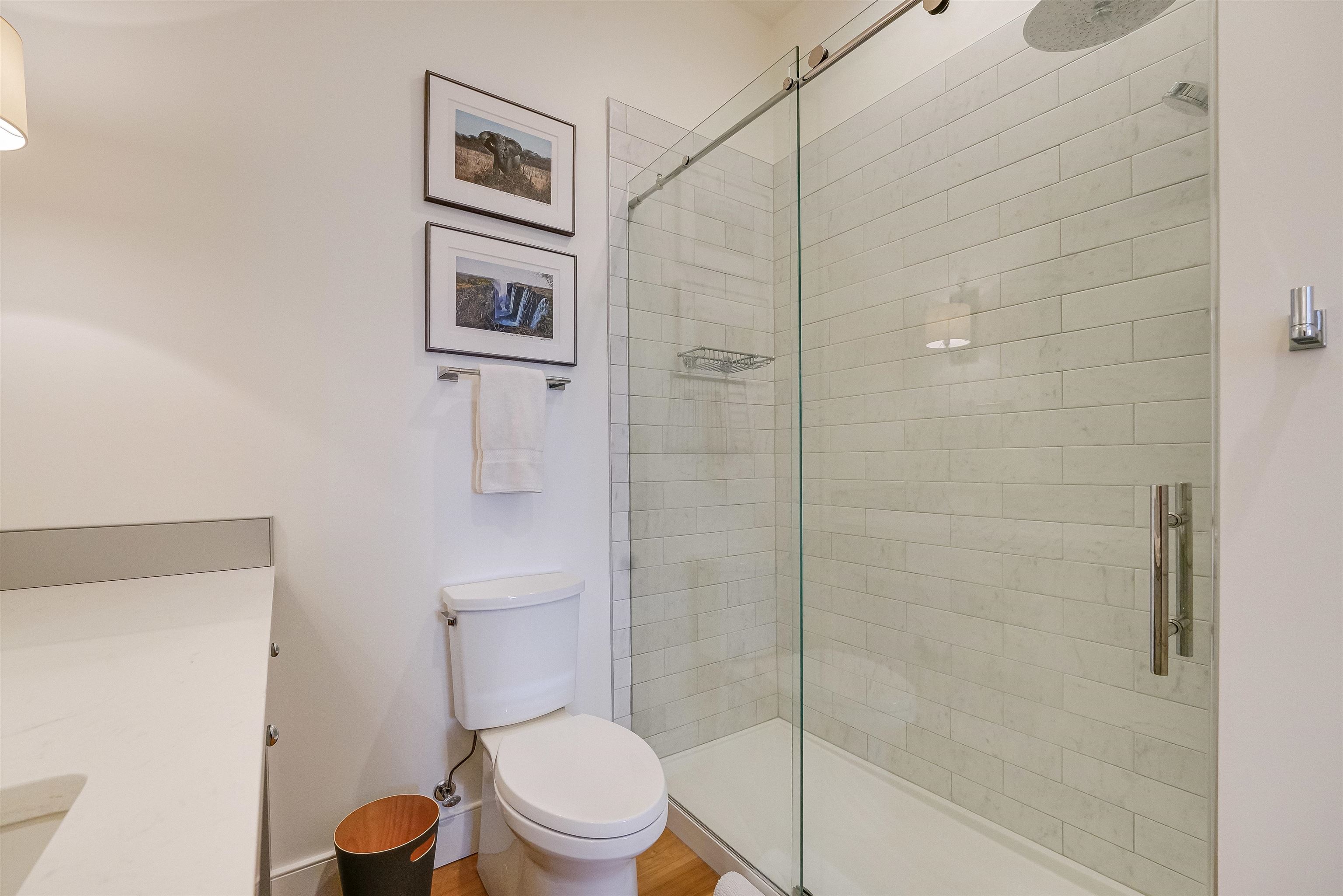 222 Clinton Street, Unit 19 Hoboken, NJ 07030 - Photo 23 of 31 a bathroom with a toilet and a shower