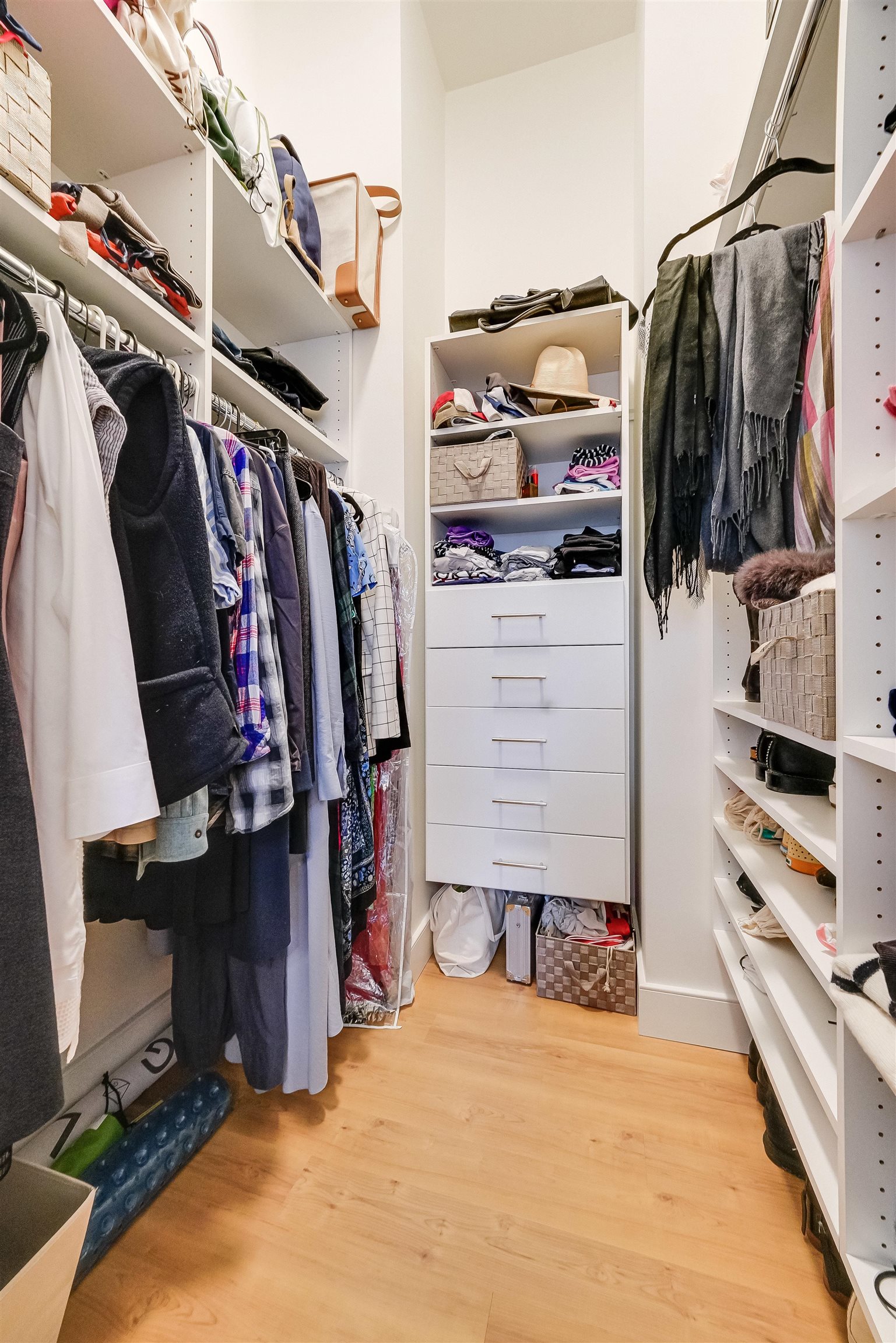 222 Clinton Street, Unit 19 Hoboken, NJ 07030 - Photo 27 of 31 a view of walk in closet with clothes and shoes