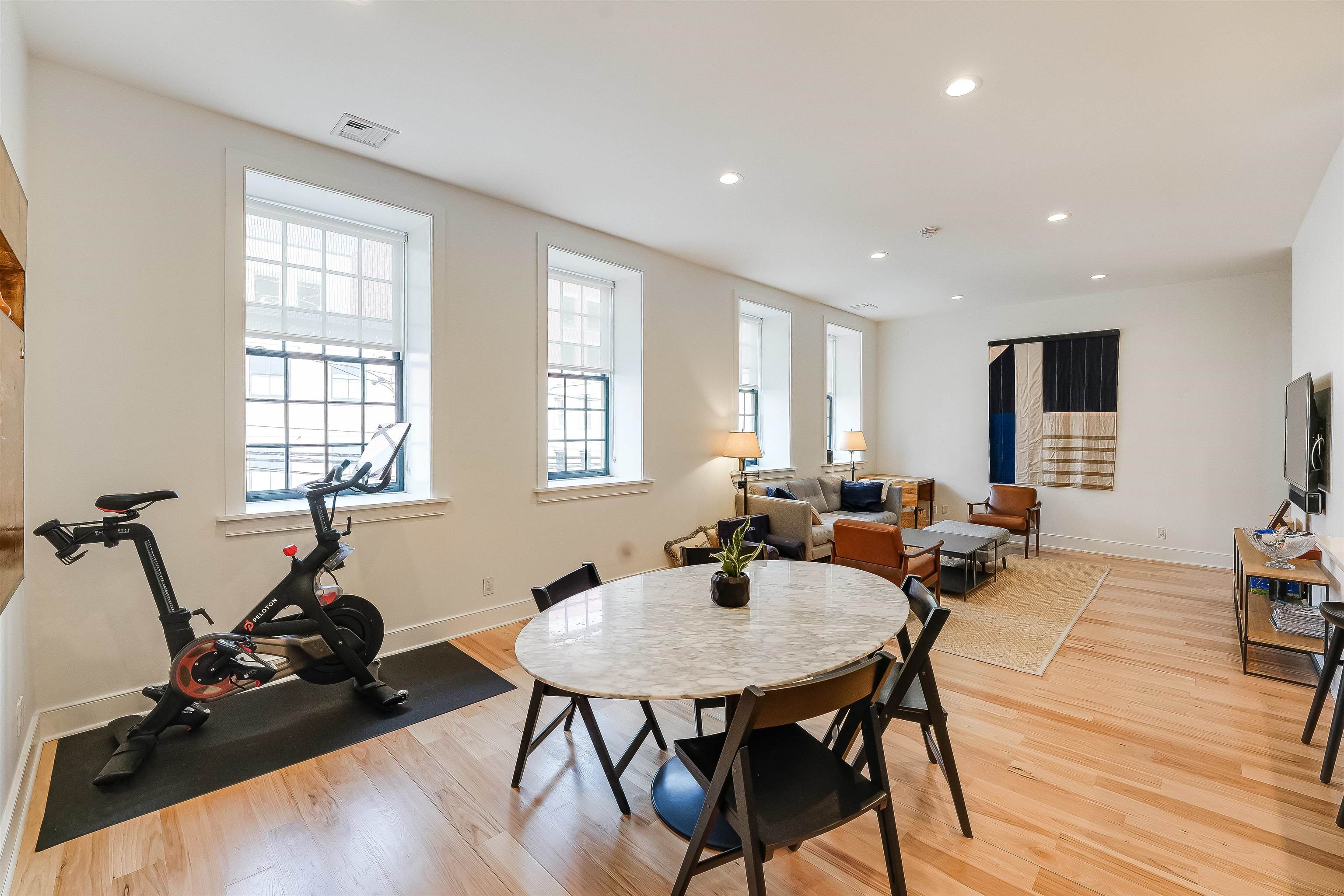 222 Clinton Street, Unit 19 Hoboken, NJ 07030 - Photo 5 of 31 a view of a dining room with furniture window and wooden floor