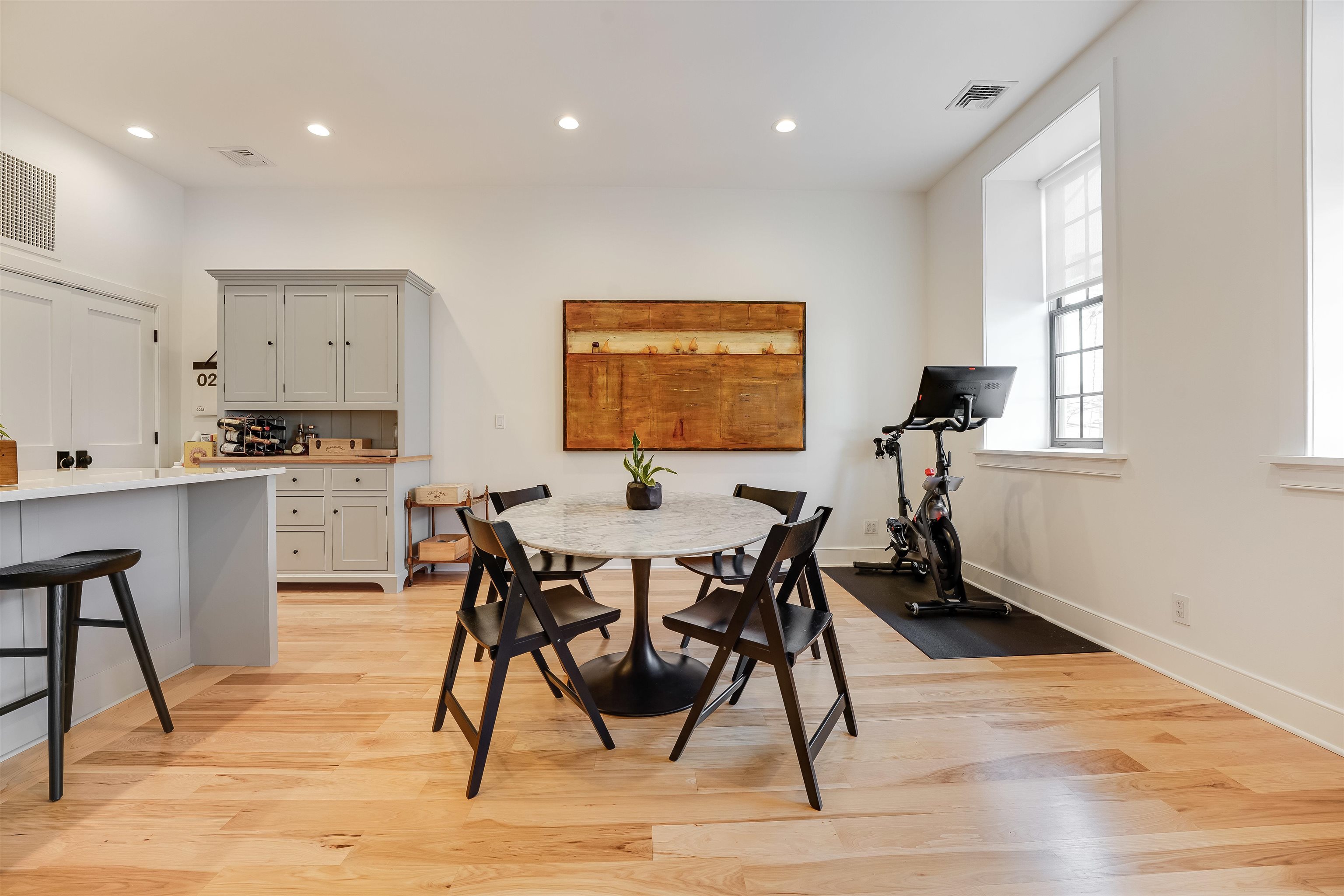 222 Clinton Street, Unit 19 Hoboken, NJ 07030 - Photo 6 of 31 a view of a dining room with furniture and wooden floor