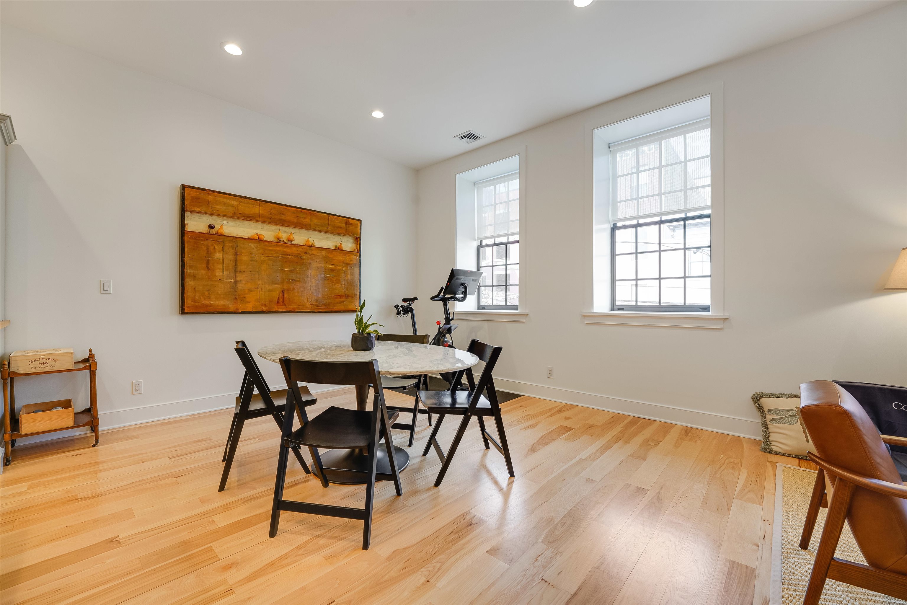 222 Clinton Street, Unit 19 Hoboken, NJ 07030 - Photo 7 of 31 a view of a dining room with furniture and wooden floor