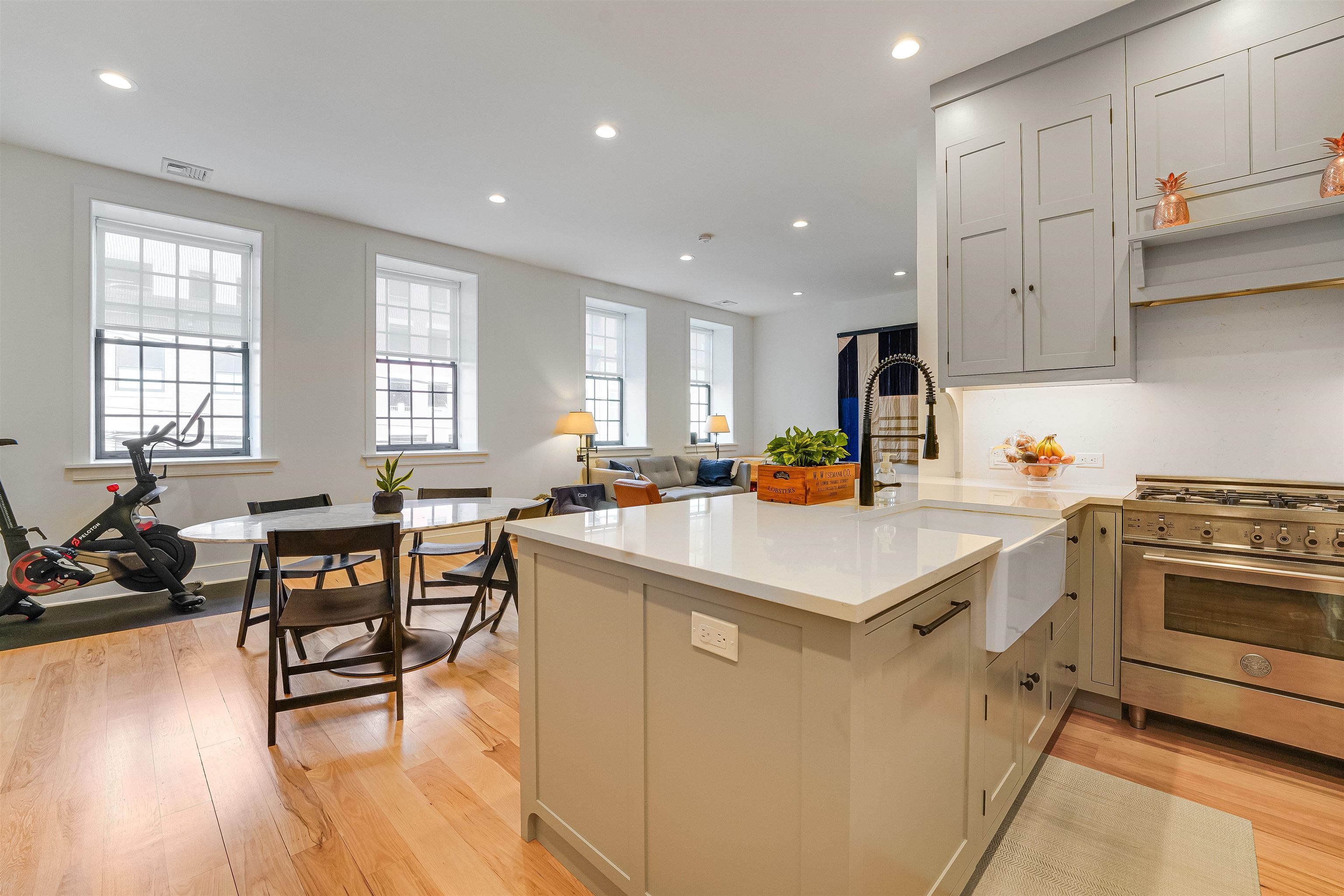 222 Clinton Street, Unit 19 Hoboken, NJ 07030 - Photo 10 of 31 a kitchen filled with white cabinets and white appliances