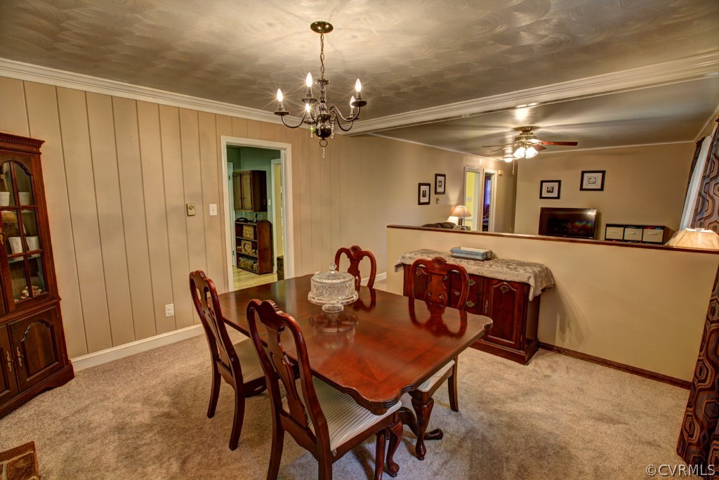 18411 Beaver Dam Road Beaverdam, VA 23015 - Photo 8 of 24 a view of a dining room with furniture and chandelier