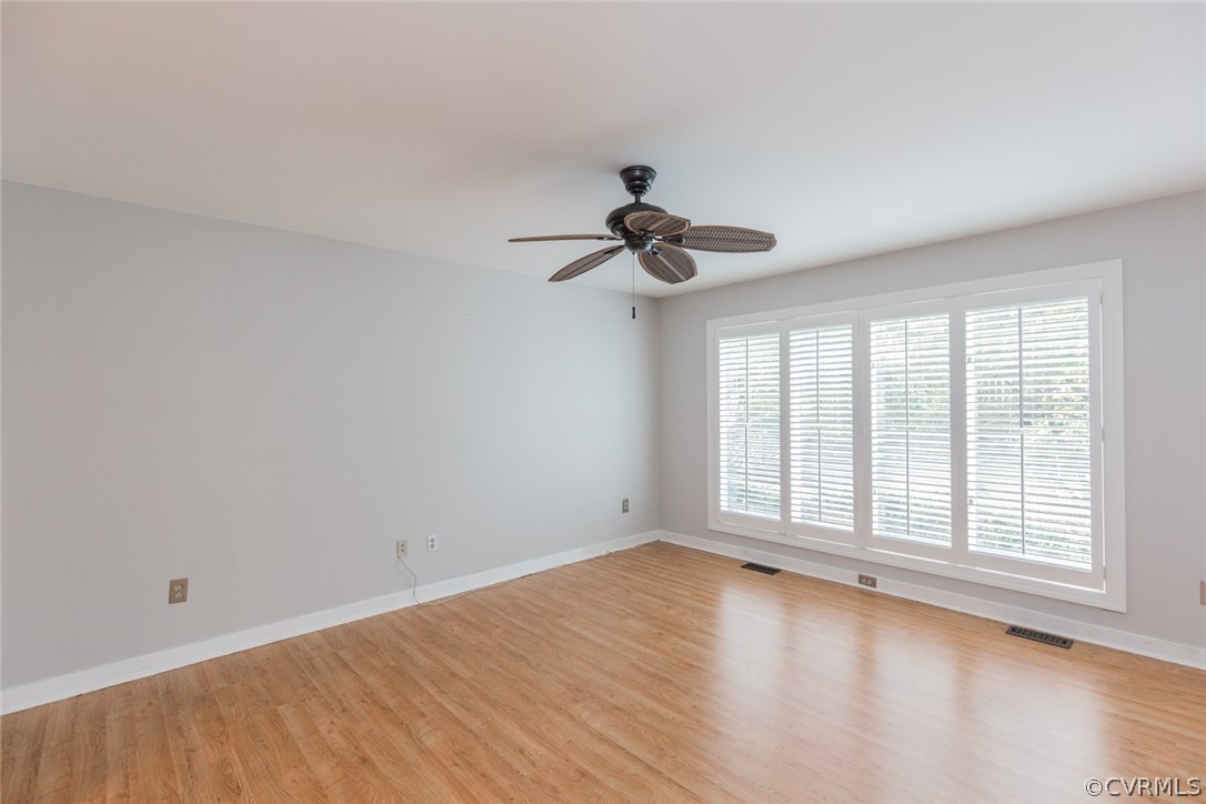 3103 E Stony Point Road, Unit END Richmond, VA 23235 - Photo 29 of 50 a view of empty room with wooden floor and fan