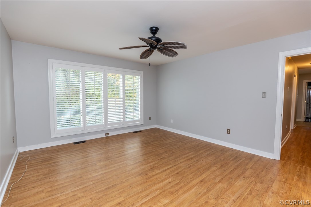 3103 E Stony Point Road, Unit END Richmond, VA 23235 - Photo 30 of 50 a view of empty room with wooden floor and fan