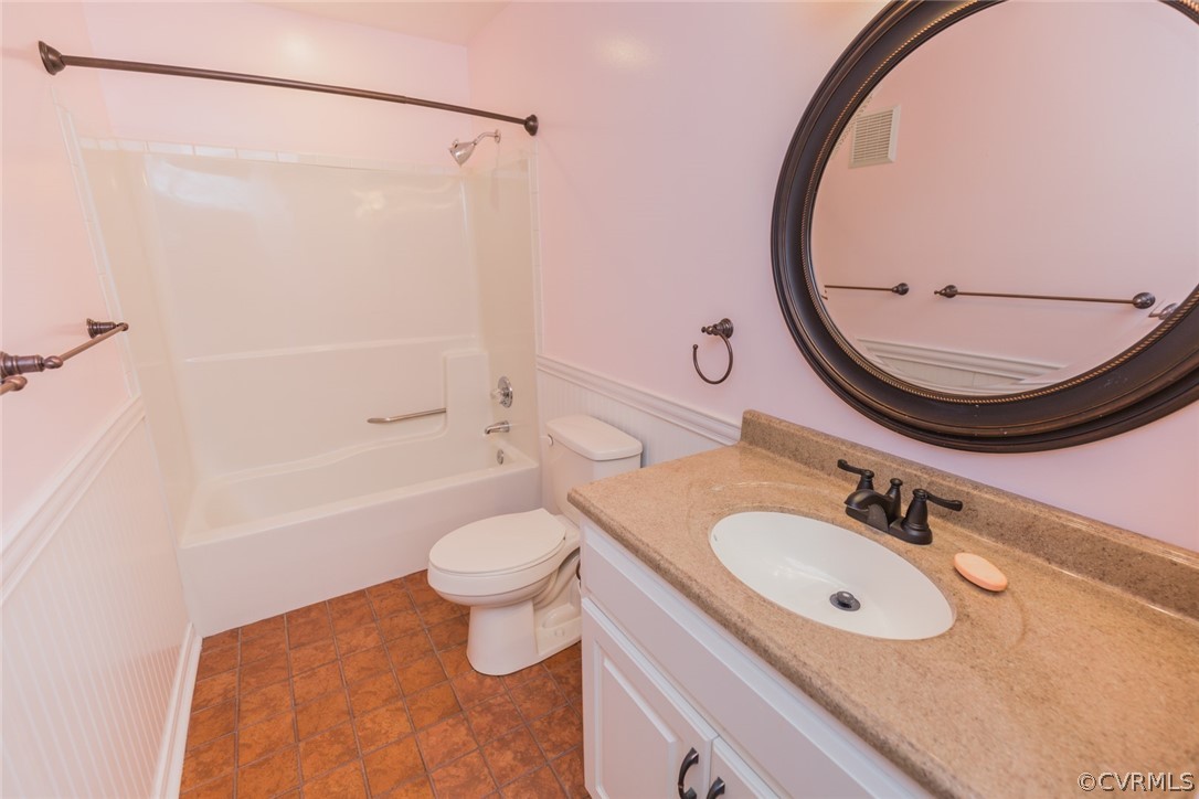 3103 E Stony Point Road, Unit END Richmond, VA 23235 - Photo 40 of 50 a bathroom with a sink a toilet and a mirror