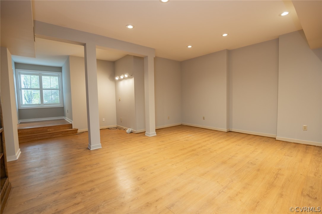 3103 E Stony Point Road, Unit END Richmond, VA 23235 - Photo 43 of 50 an empty room with wooden floor and a window