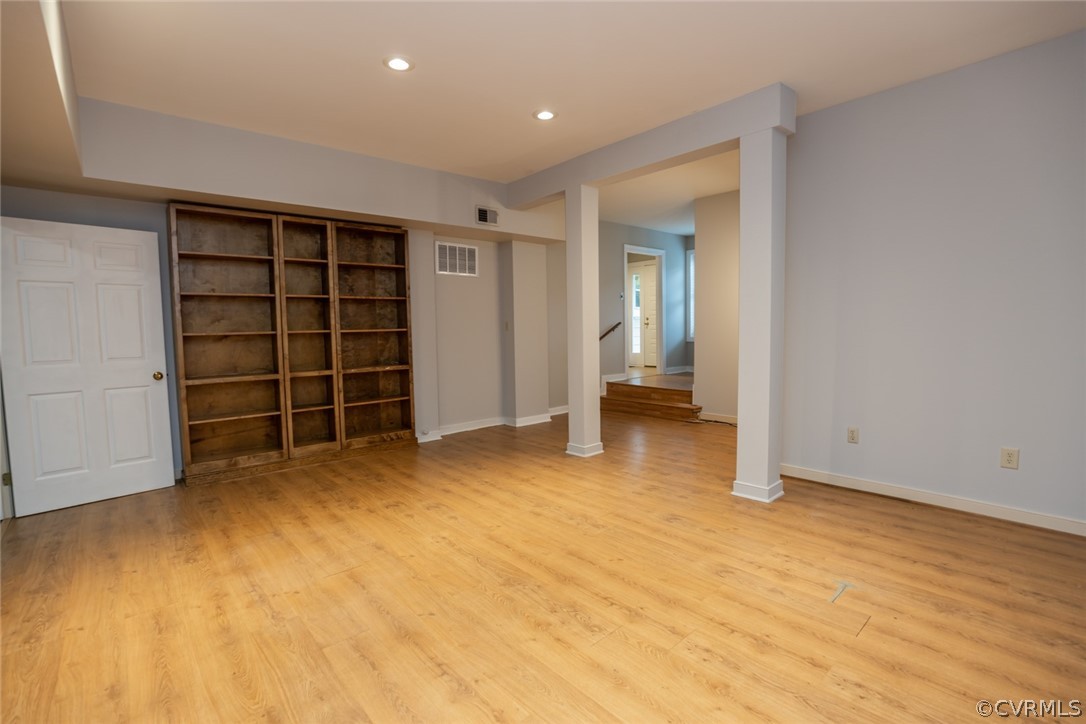 3103 E Stony Point Road, Unit END Richmond, VA 23235 - Photo 44 of 50 a view of an empty room with a closet and cabinet