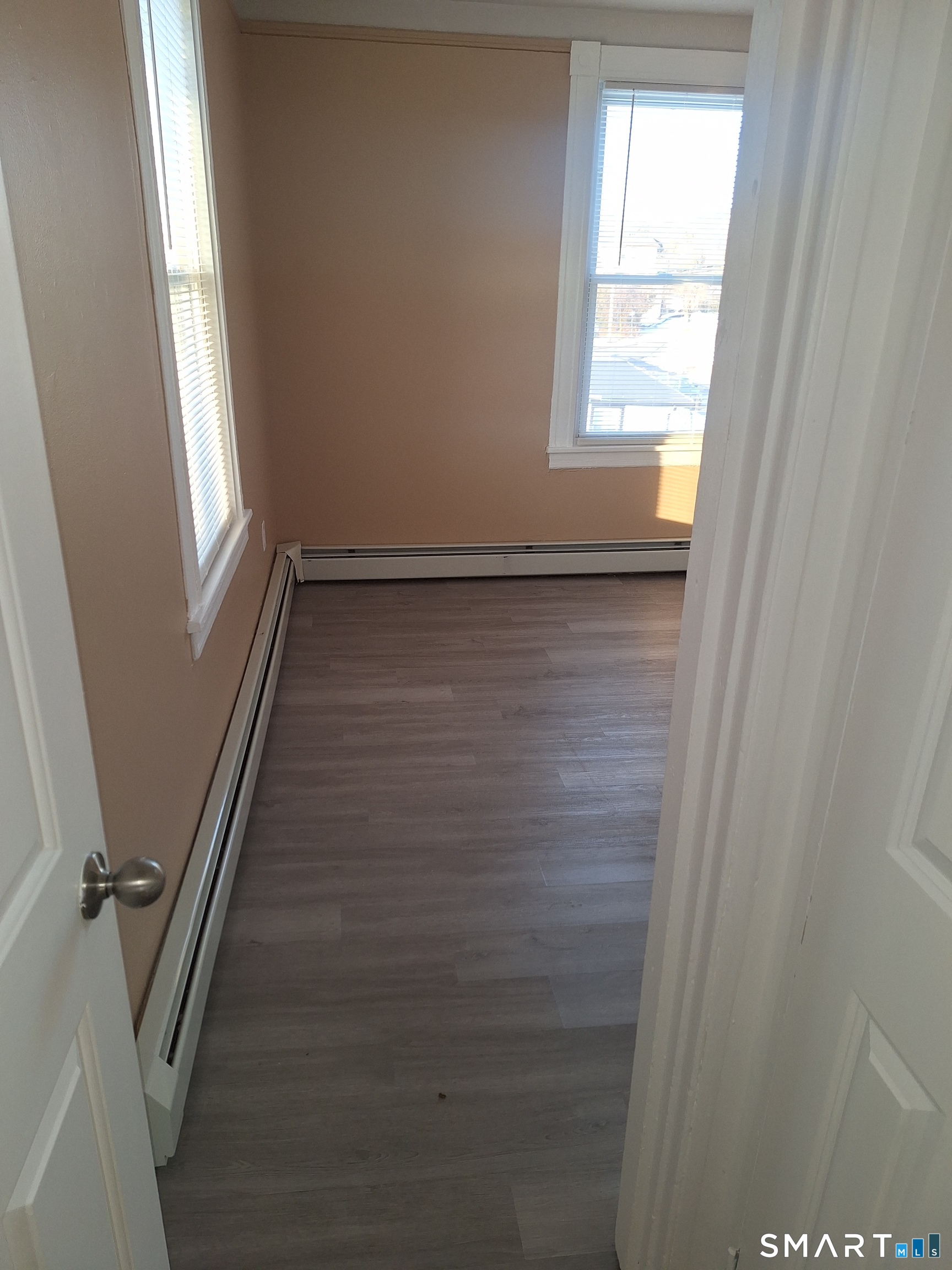 23 1/2 North Spring Street, Unit 3 Ansonia, CT 06401 - Photo 3 of 12 a view of balcony with window