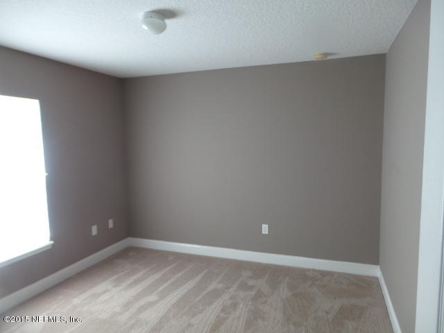 54100 Church Road Callahan, FL 32011 - Photo 6 of 10 an empty room with a window