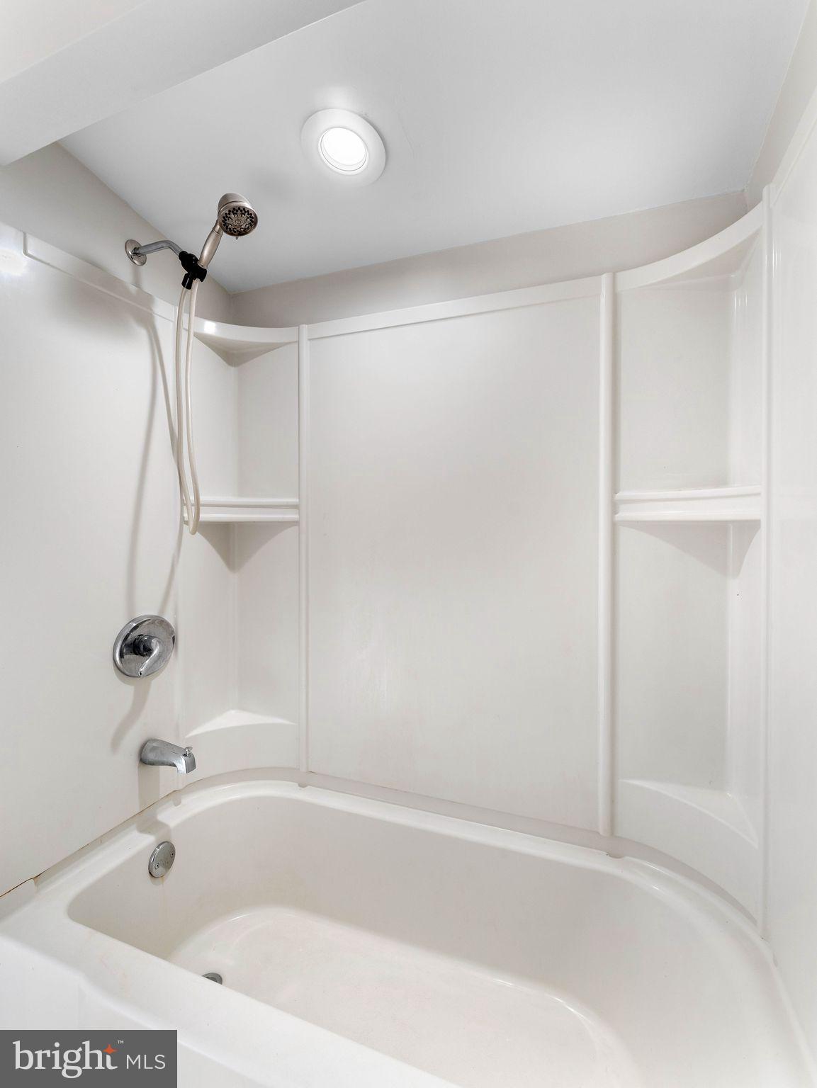 860 Pennsylvania Avenue Delanco, NJ 08075 - Photo 15 of 28 a white bath tub sitting next to a shower