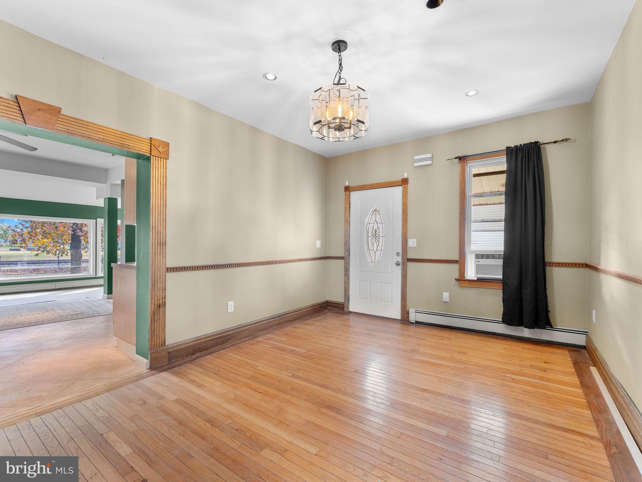 860 Pennsylvania Avenue Delanco, NJ 08075 - Photo 10 of 28 wooden floor in an empty room with a window