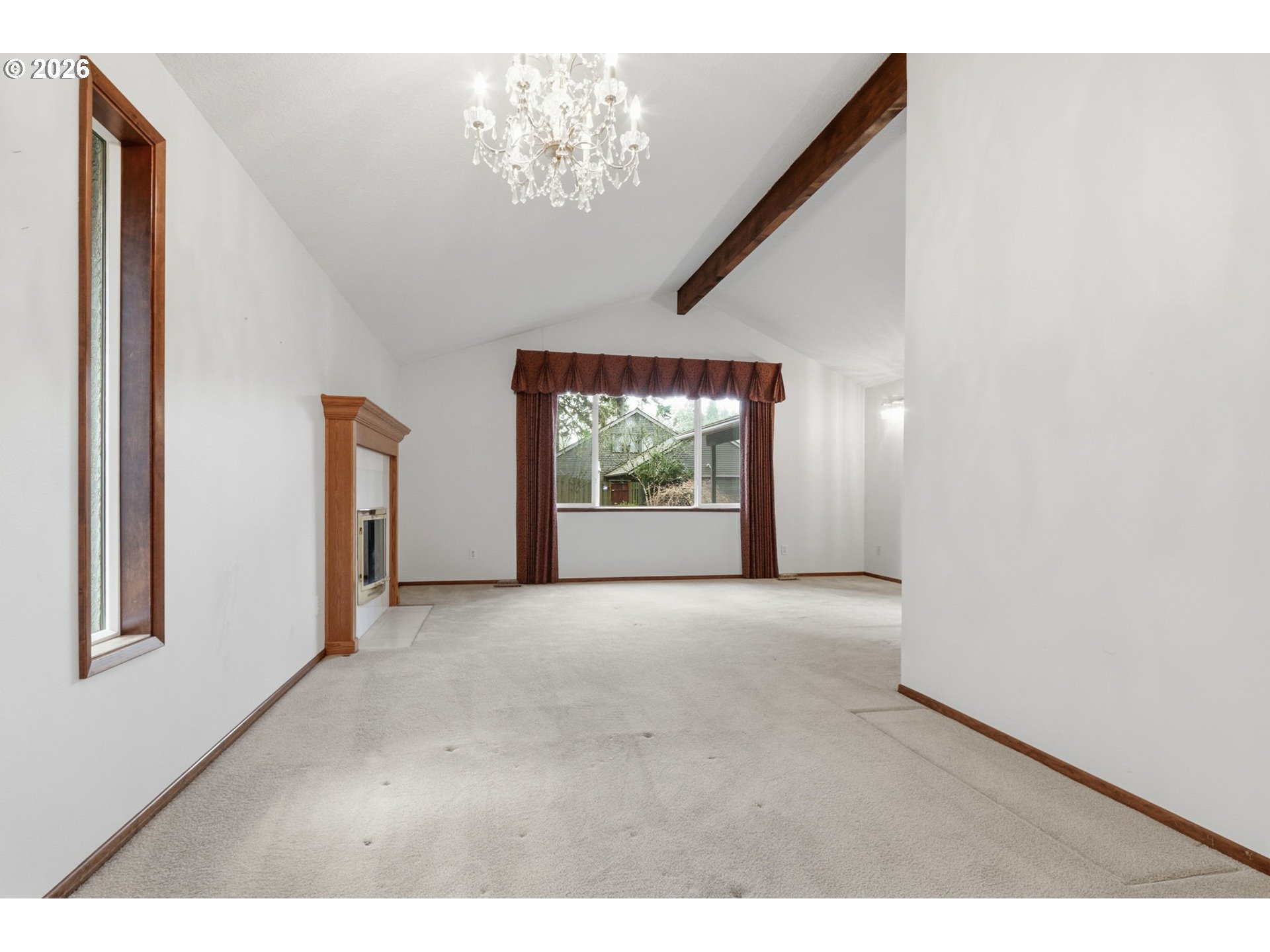 7250 Southwest 28th Court Beaverton, OR 97008 - Photo 12 of 45 a view of an empty room with a window