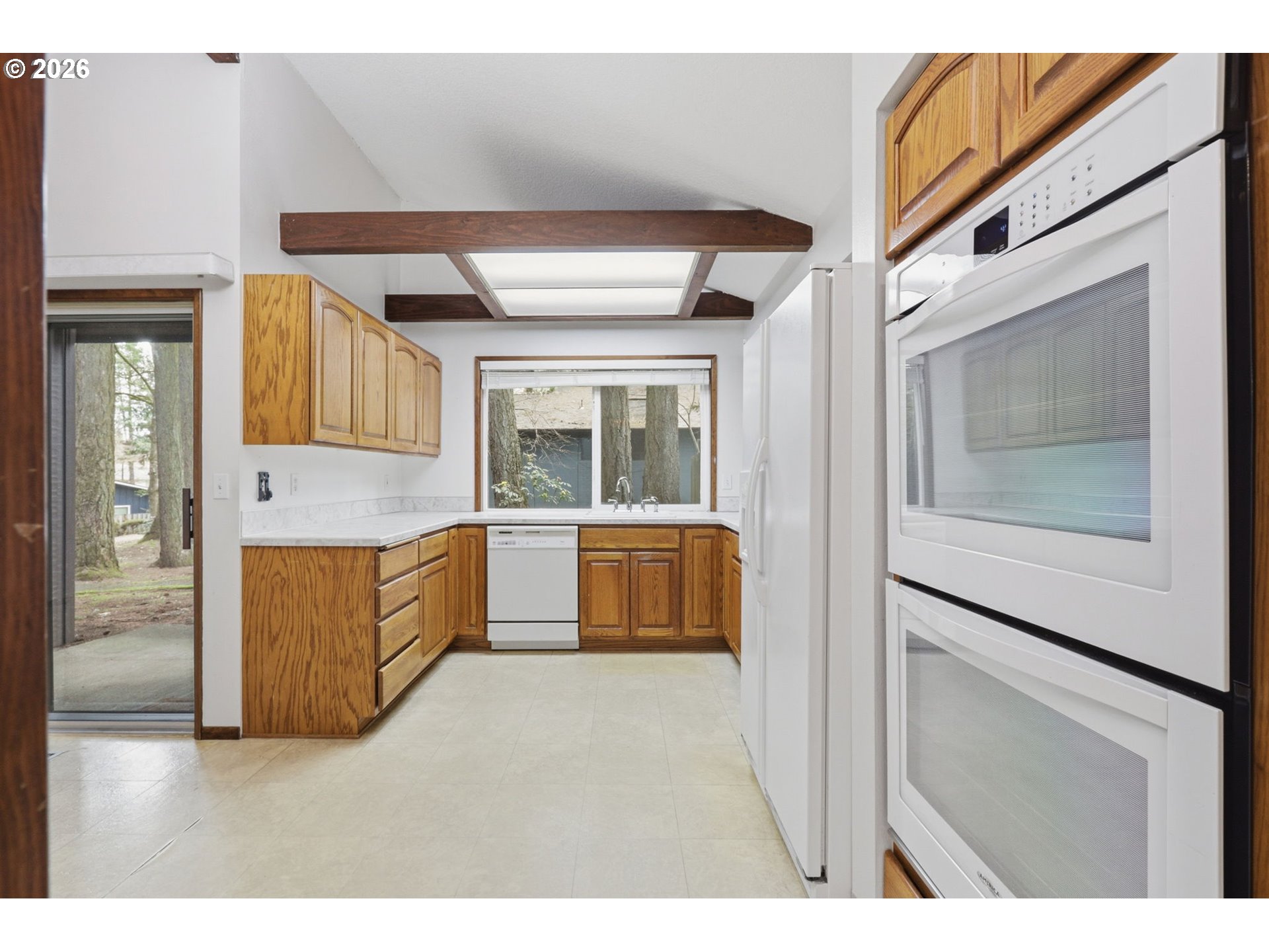 7250 Southwest 28th Court Beaverton, OR 97008 - Photo 13 of 45 a living room with a couch and a view of living room