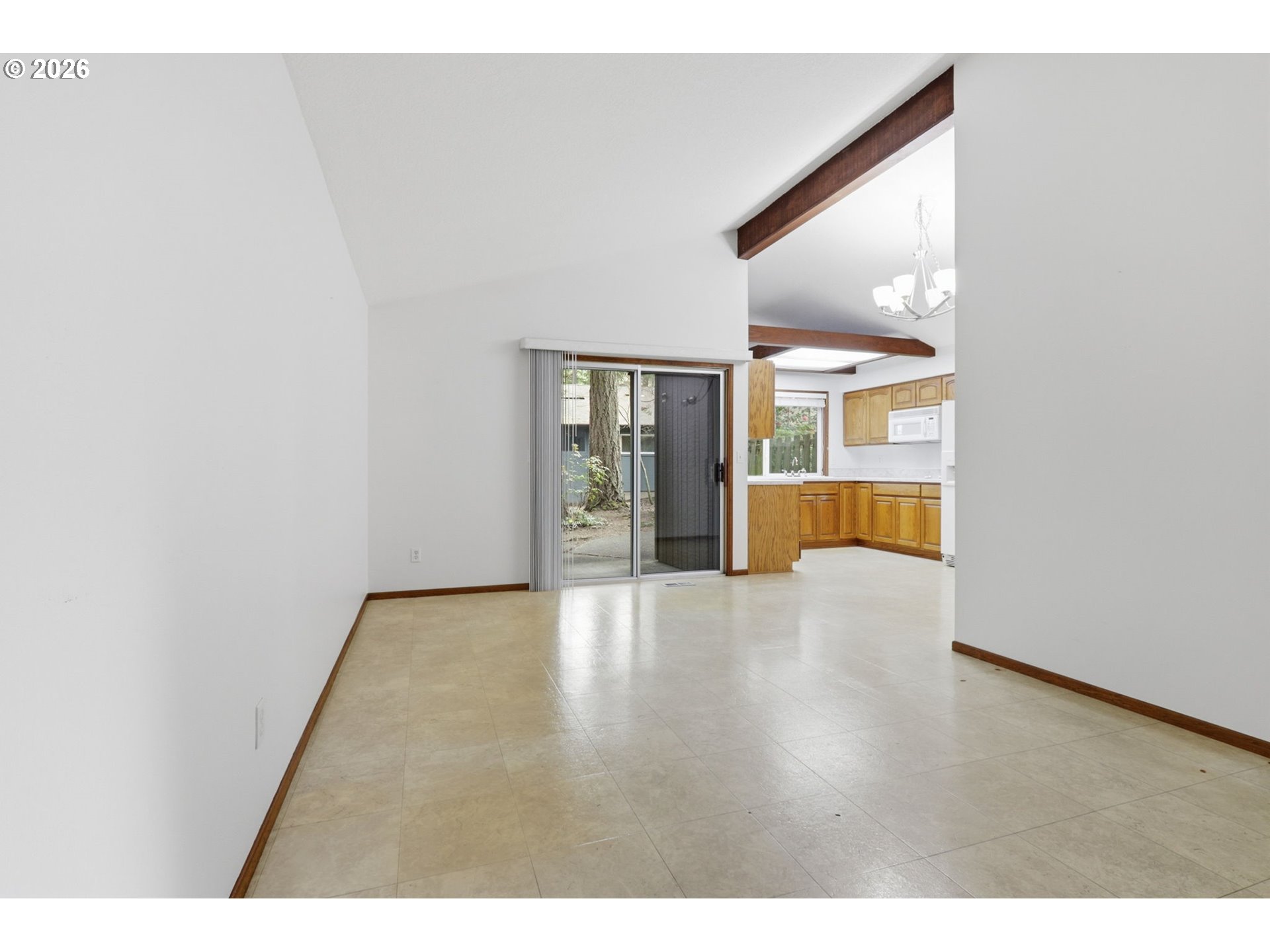 7250 Southwest 28th Court Beaverton, OR 97008 - Photo 19 of 45 a view of an empty room with a window