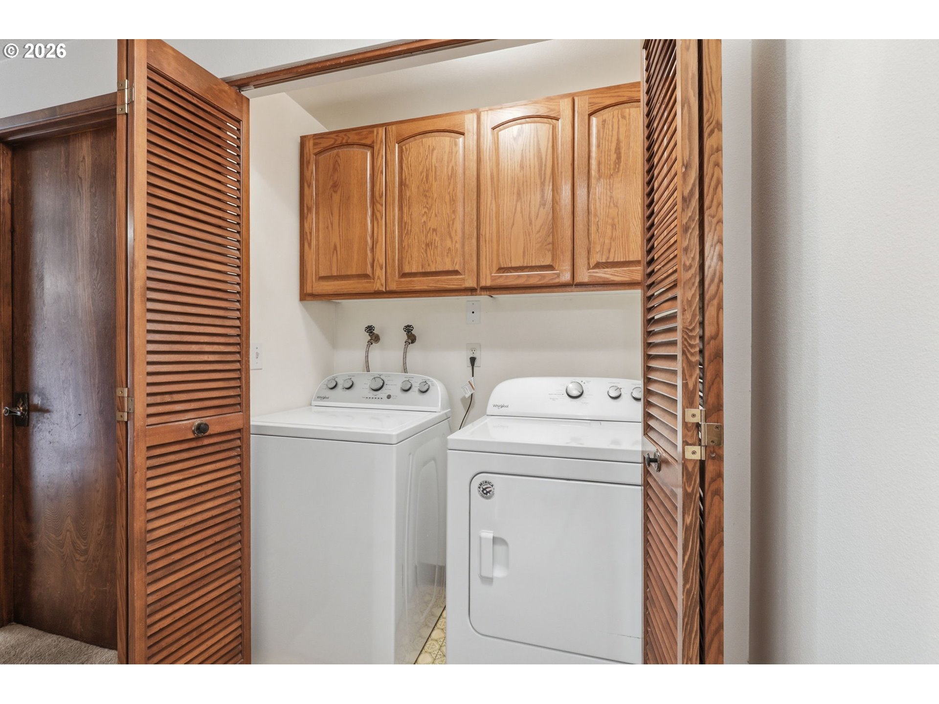 7250 Southwest 28th Court Beaverton, OR 97008 - Photo 22 of 45 a utility room with dryer and washer