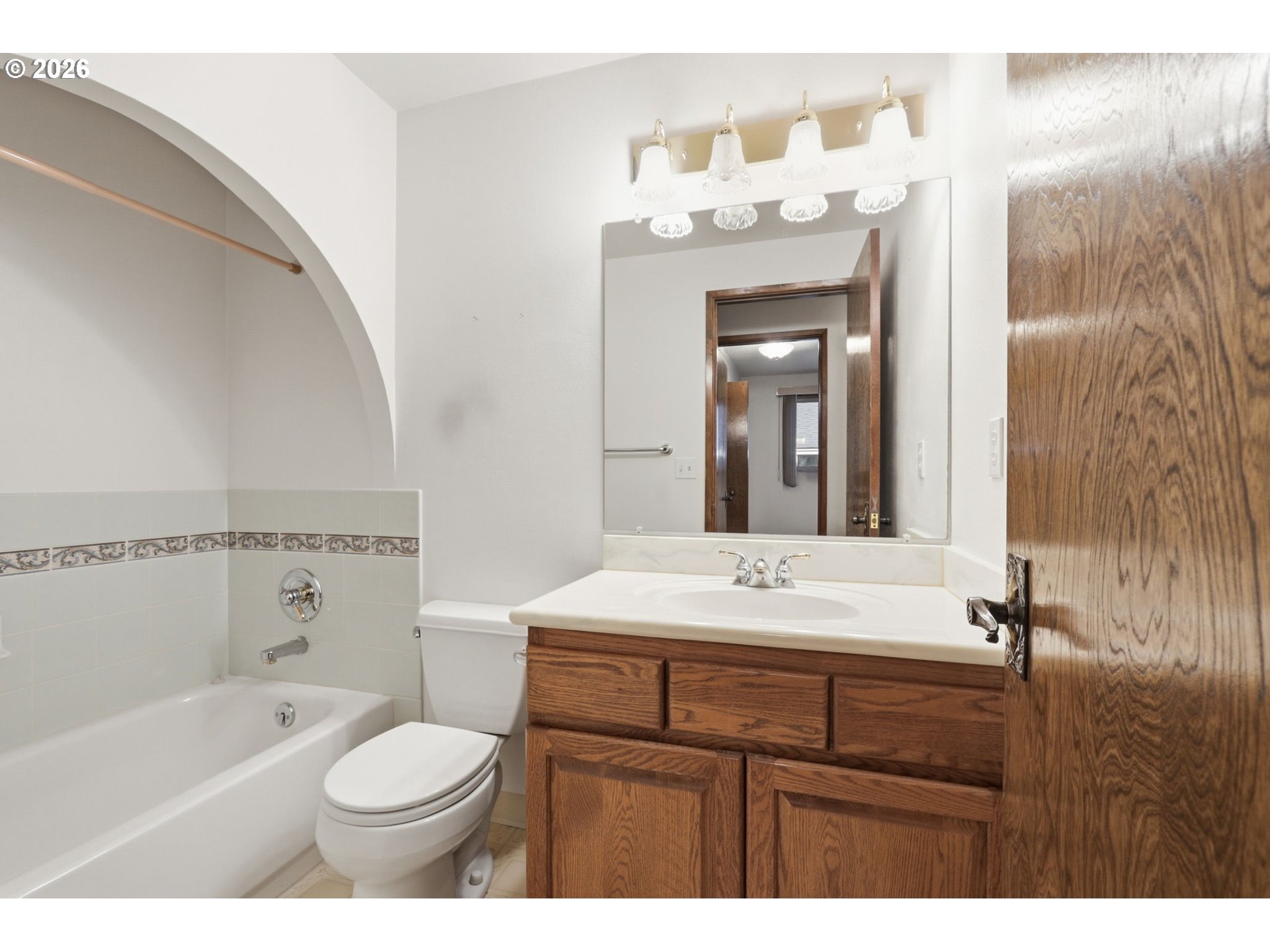 7250 Southwest 28th Court Beaverton, OR 97008 - Photo 23 of 45 a bathroom with a sink a toilet and shower